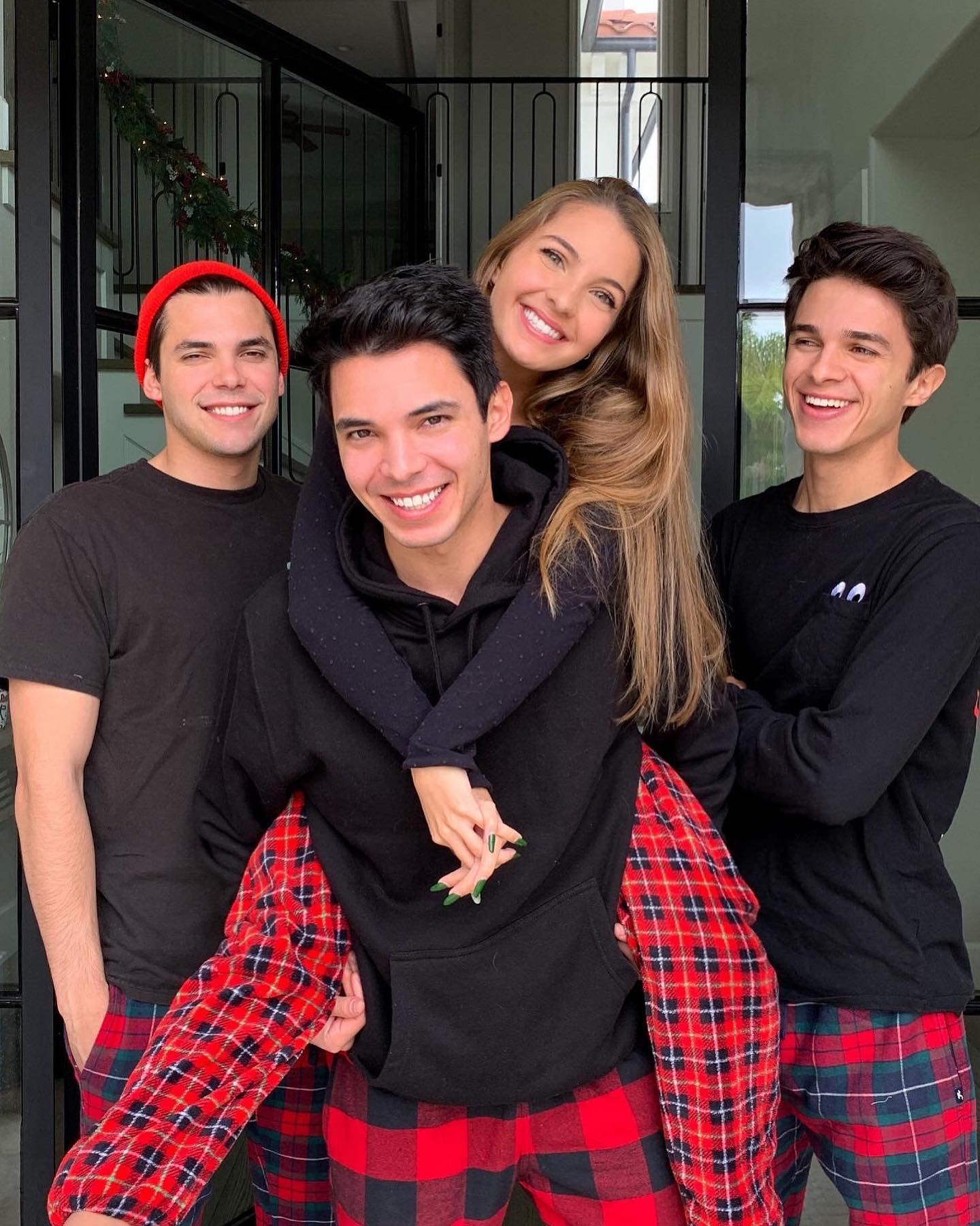 Lexi Rivera with her brothers