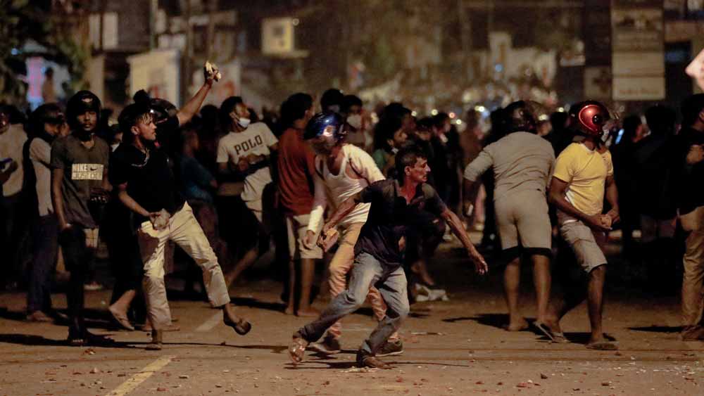 1 killed in protests in Sri Lanka curfew imposed