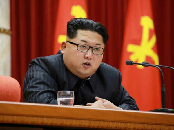Five-faced Kim praises outgoing South Korean president