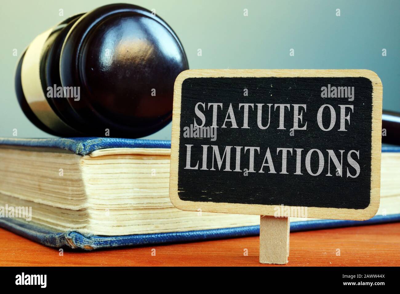 statute of limitations sign book and gavel 2AWW44X