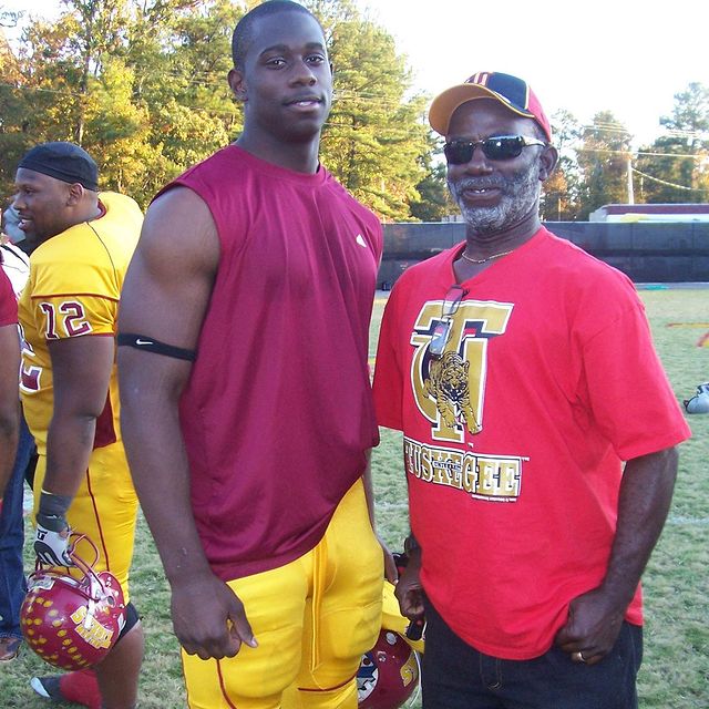 Derrick Jaxn with his father