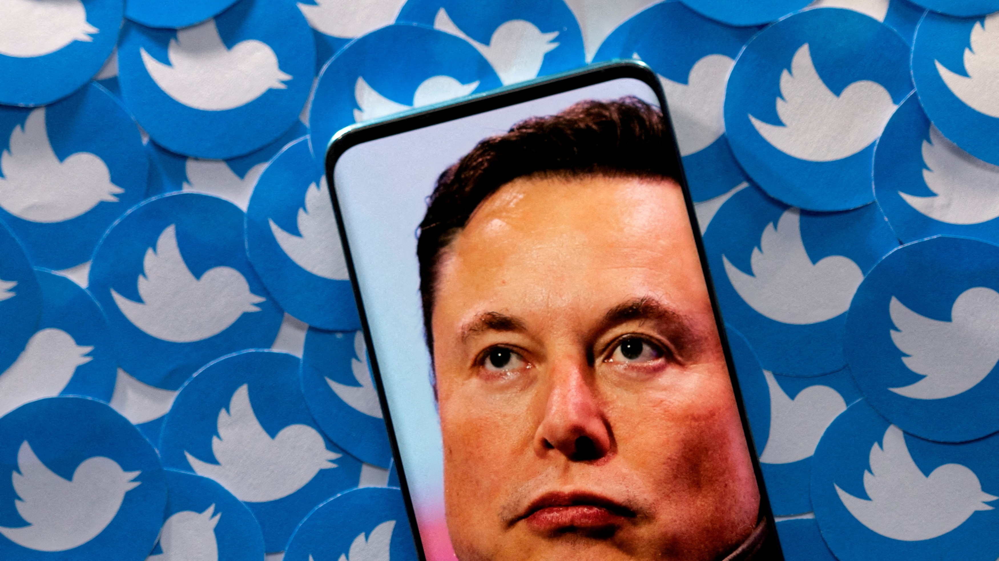 Elon Musk abandons Twitter deal, company threatens legal action