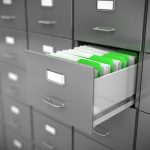 open filing cabinet filled with files