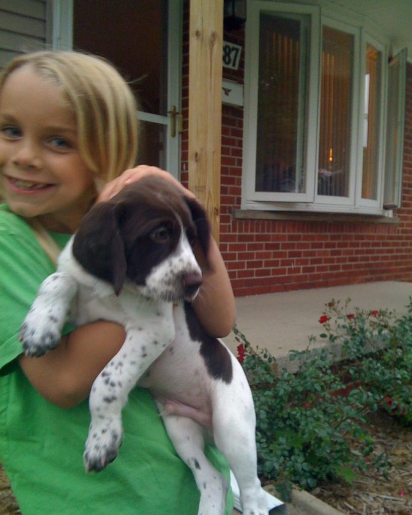 Childhood Image of Anna Shumate with her pet