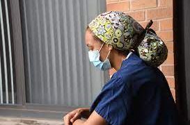 Why do nurses wear scrub hats?