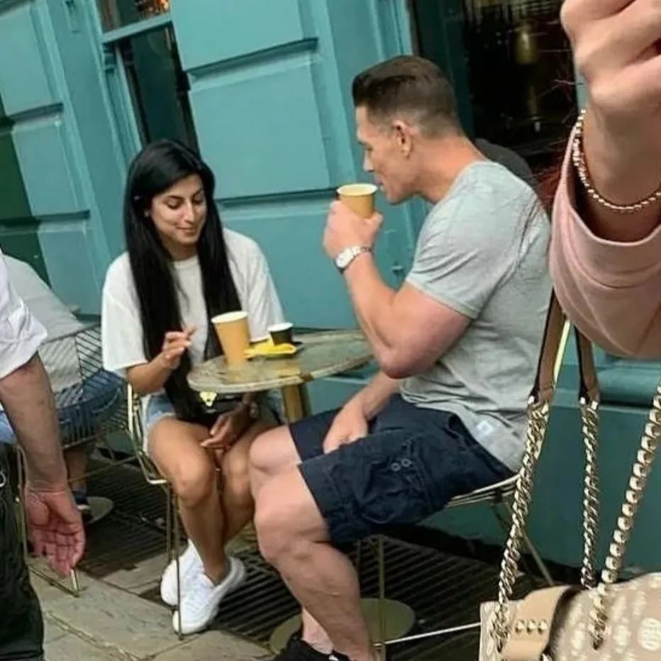 Shay Shariatzadeh and John Cena meet in a restaurant