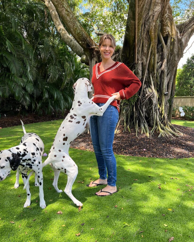 Amanda Cerny with her pet dogs