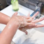 Close up of woman washing her hands with soap 1296x728 header