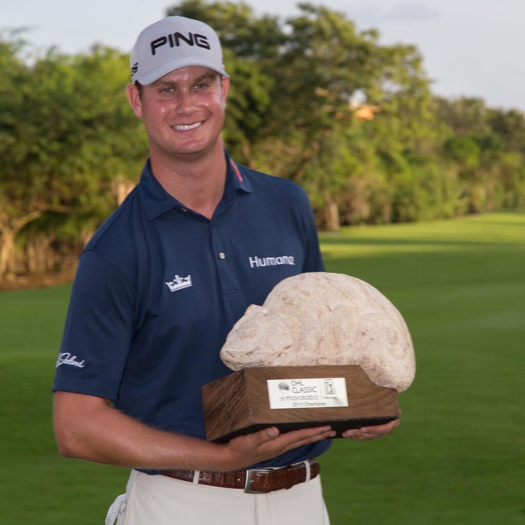 Harris English holds the trophy of OHL CLASSIC at Mayakoba 2013 Championship