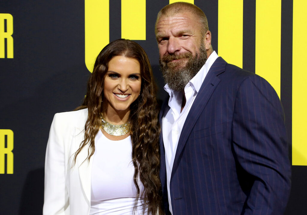Triple H with his girlfriend image