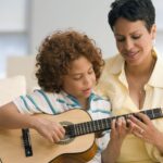 How to Teach a Child to Play the Guitar: A Comprehensive Guide
