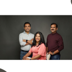 Three people posing for a professional portrait.