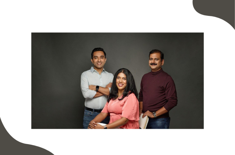 Three people posing for a professional portrait.